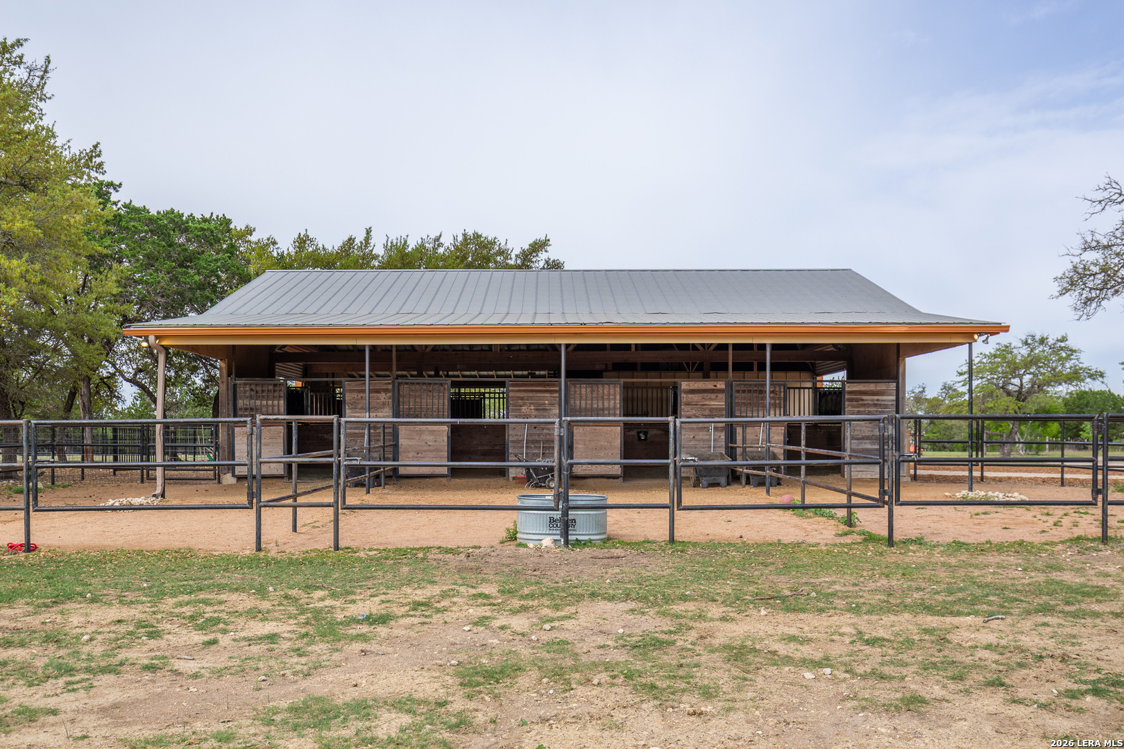 395 Bluff Creek Road North Center Point, TX 78010 - Photo 28 of 50 a backyard of a house with barbeque oven