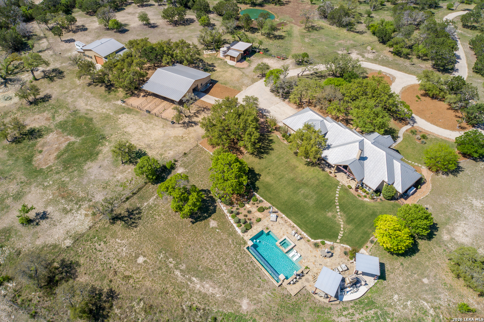 395 Bluff Creek Road North Center Point, TX 78010 - Photo 37 of 50 an aerial view of a house with a yard