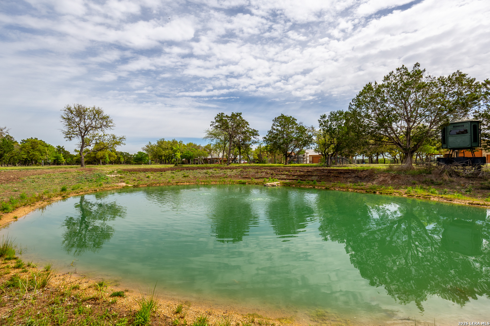395 Bluff Creek Road North Center Point, TX 78010 - Photo 38 of 50 a view of lake with green space