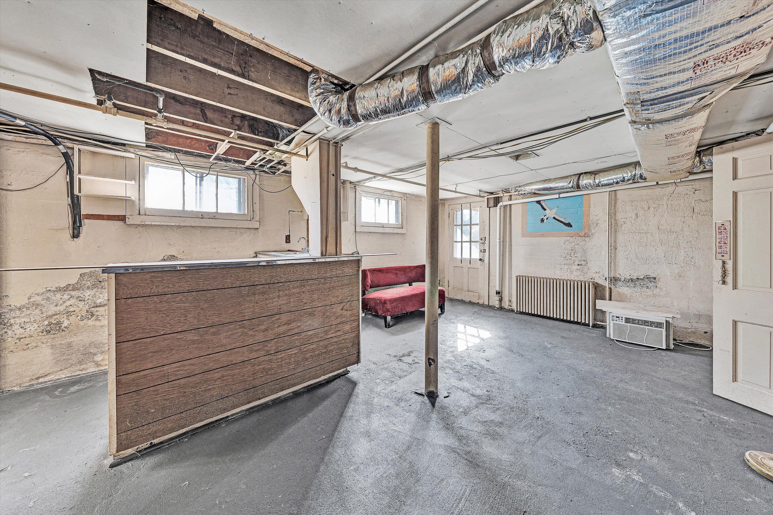 810 Windsor Avenue Southwest Roanoke, VA 24015 - Photo 16 of 21 a room with lot of furniture