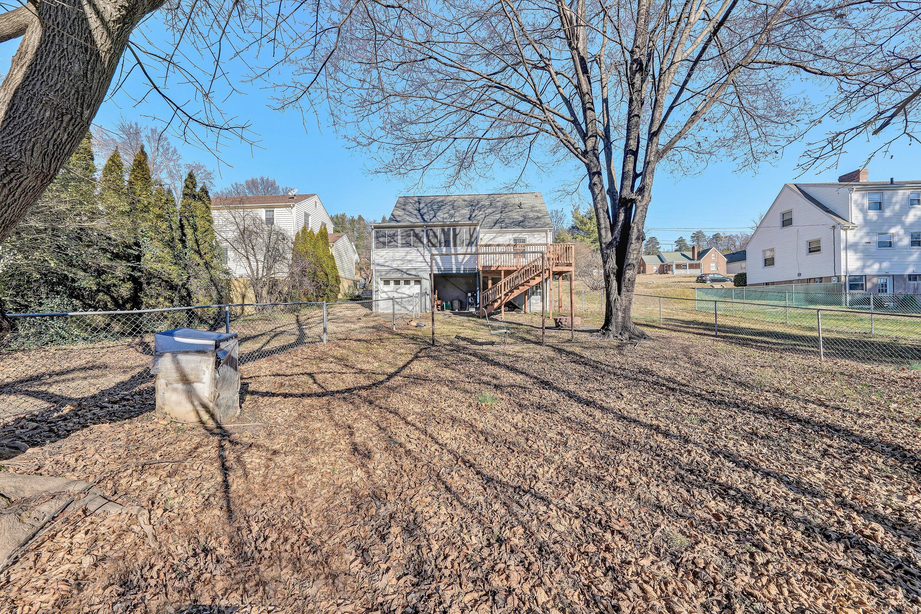 810 Windsor Avenue Southwest Roanoke, VA 24015 - Photo 20 of 21 a view of a backyard with large trees
