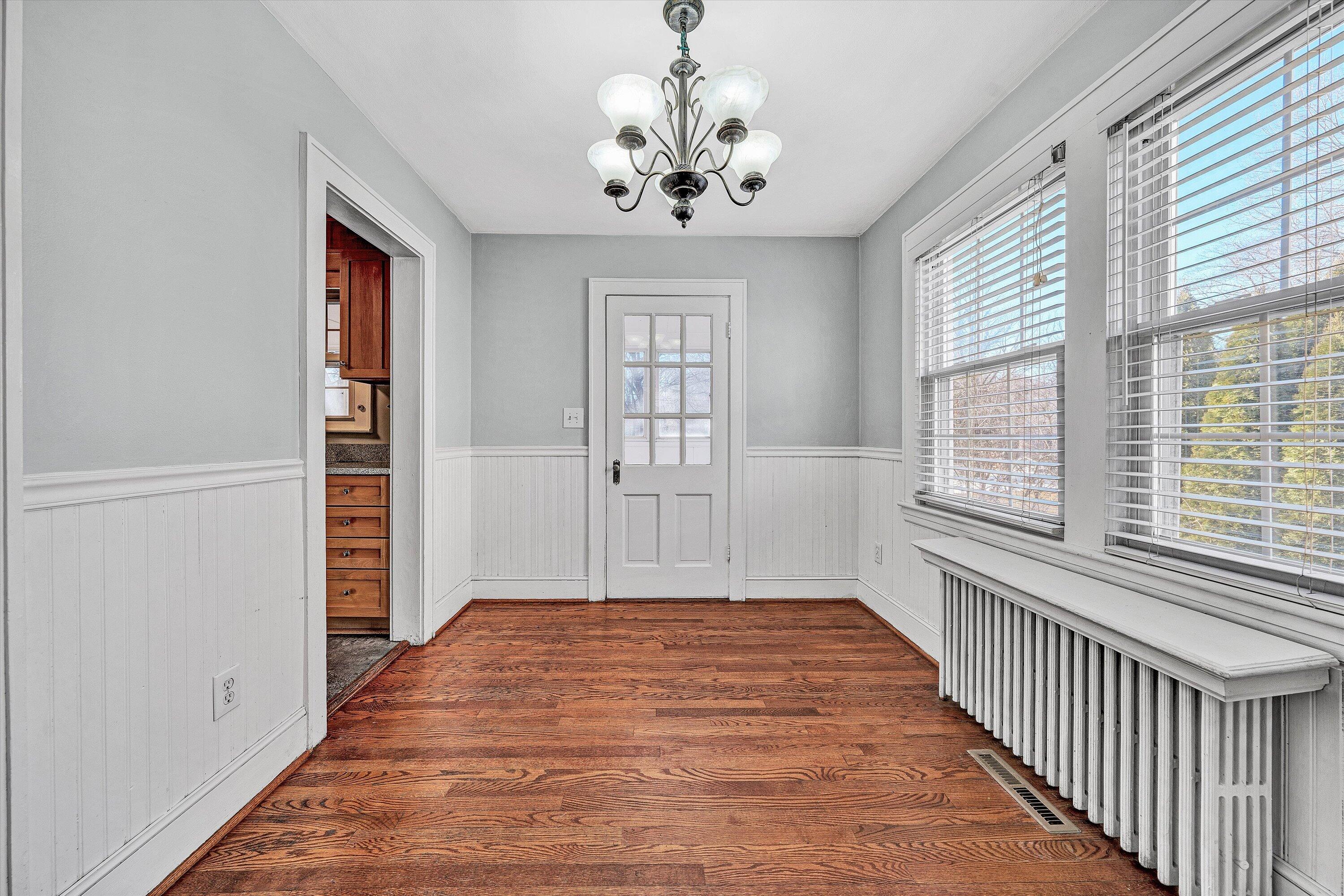 810 Windsor Avenue Southwest Roanoke, VA 24015 - Photo 5 of 21 a view of an empty room with a window