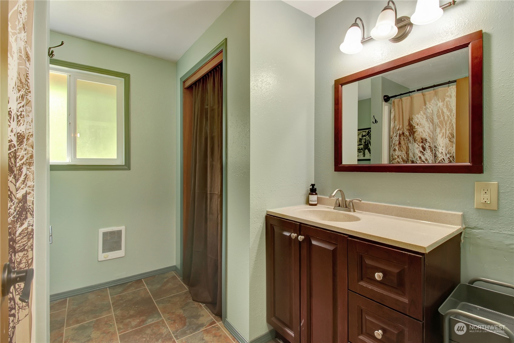 2009 South Lake Roesiger Road Snohomish, WA 98290 - Photo 19 of 39 a bathroom with a sink and a mirror