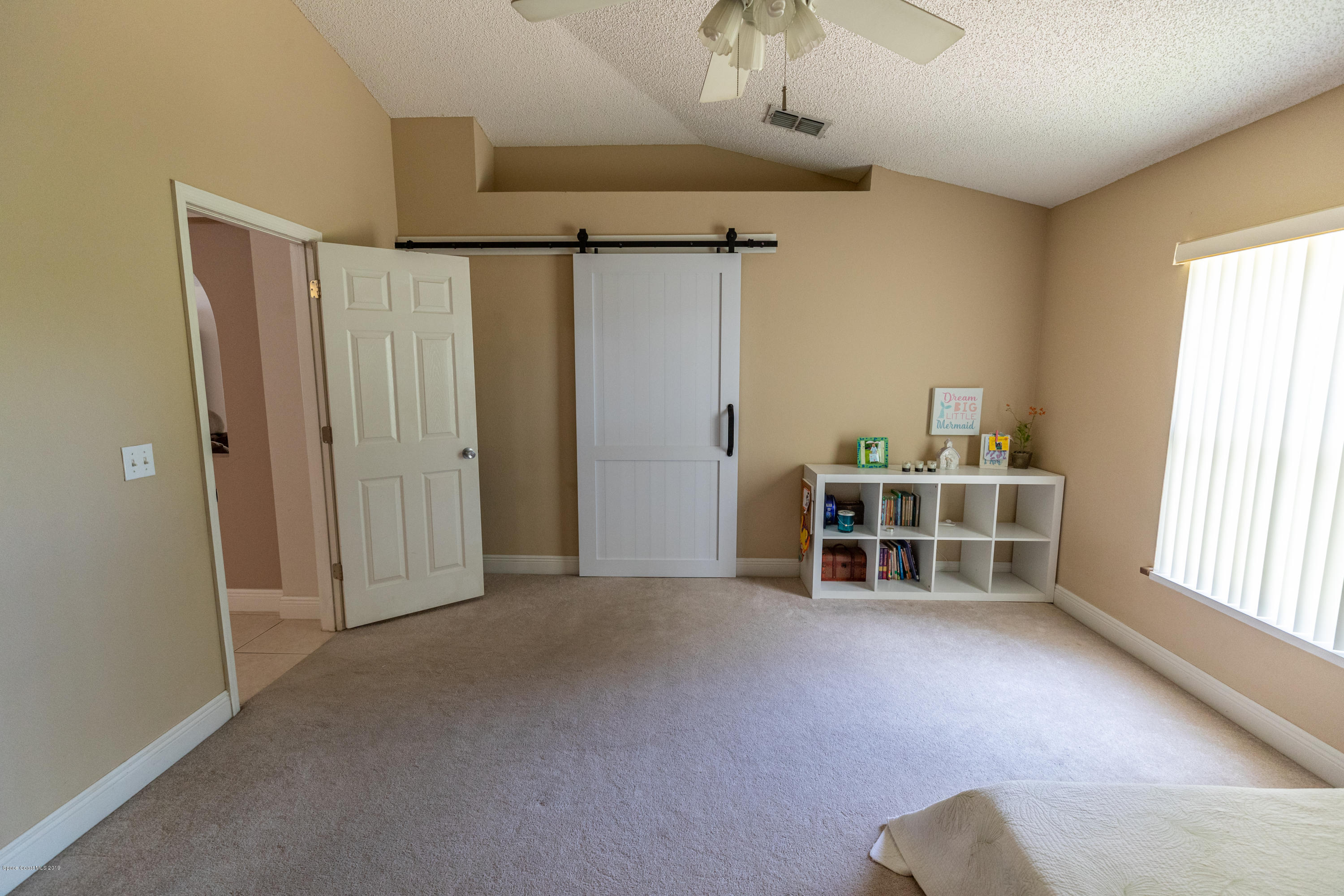 3956 Four Lakes Drive Melbourne, FL 32940 - Photo 12 of 23 Sliding door to master bath