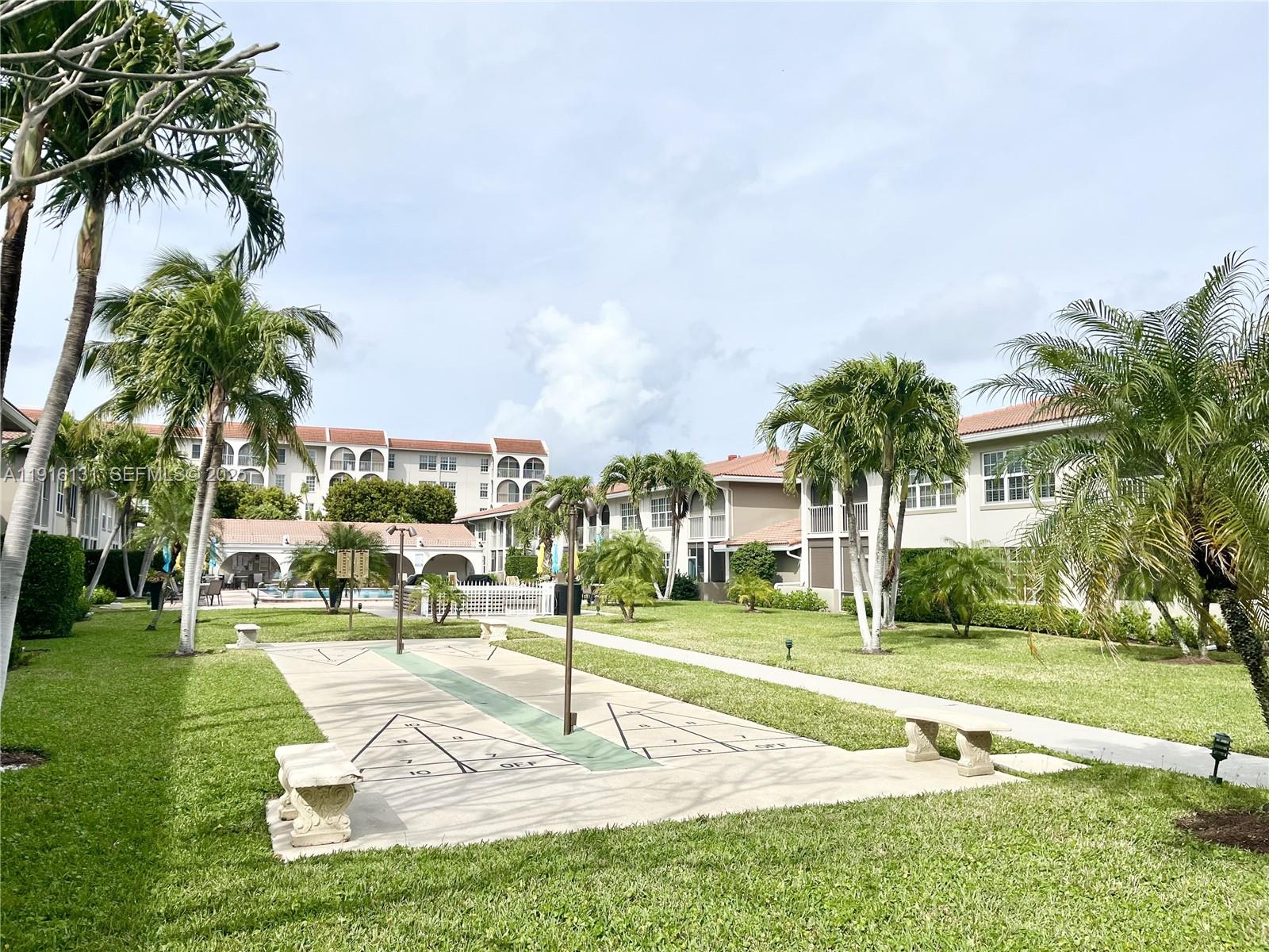 250 Northeast 20th Street, Unit 5250 Boca Raton, FL 33431 - Photo 18 of 19 a park with palm trees