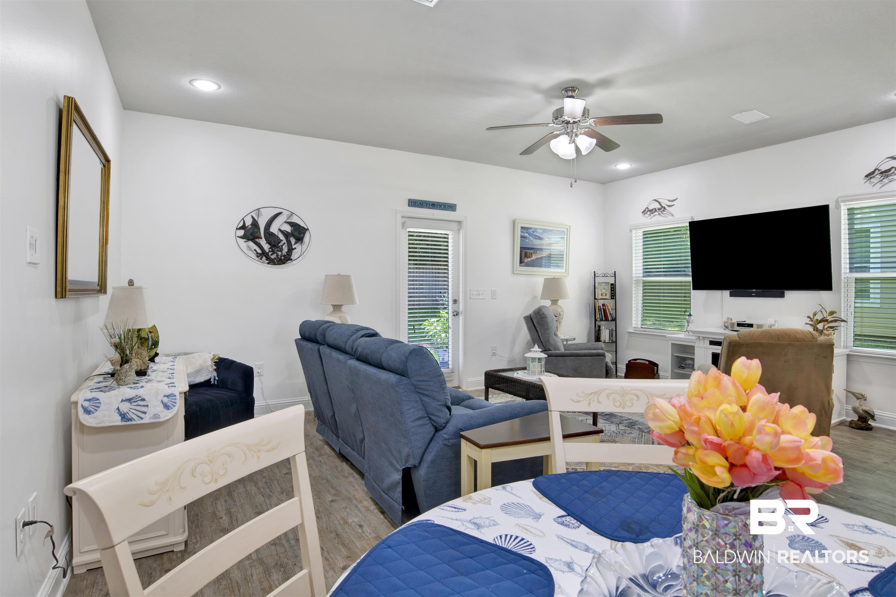 25806 Pollard Road, Unit 20 Daphne, AL 36526 - Photo 12 of 29 Dining space featuring ceiling fan, light hardwood / wood-style flooring, and a wealth of natural light