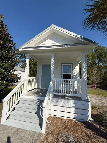 a view of a house with a street