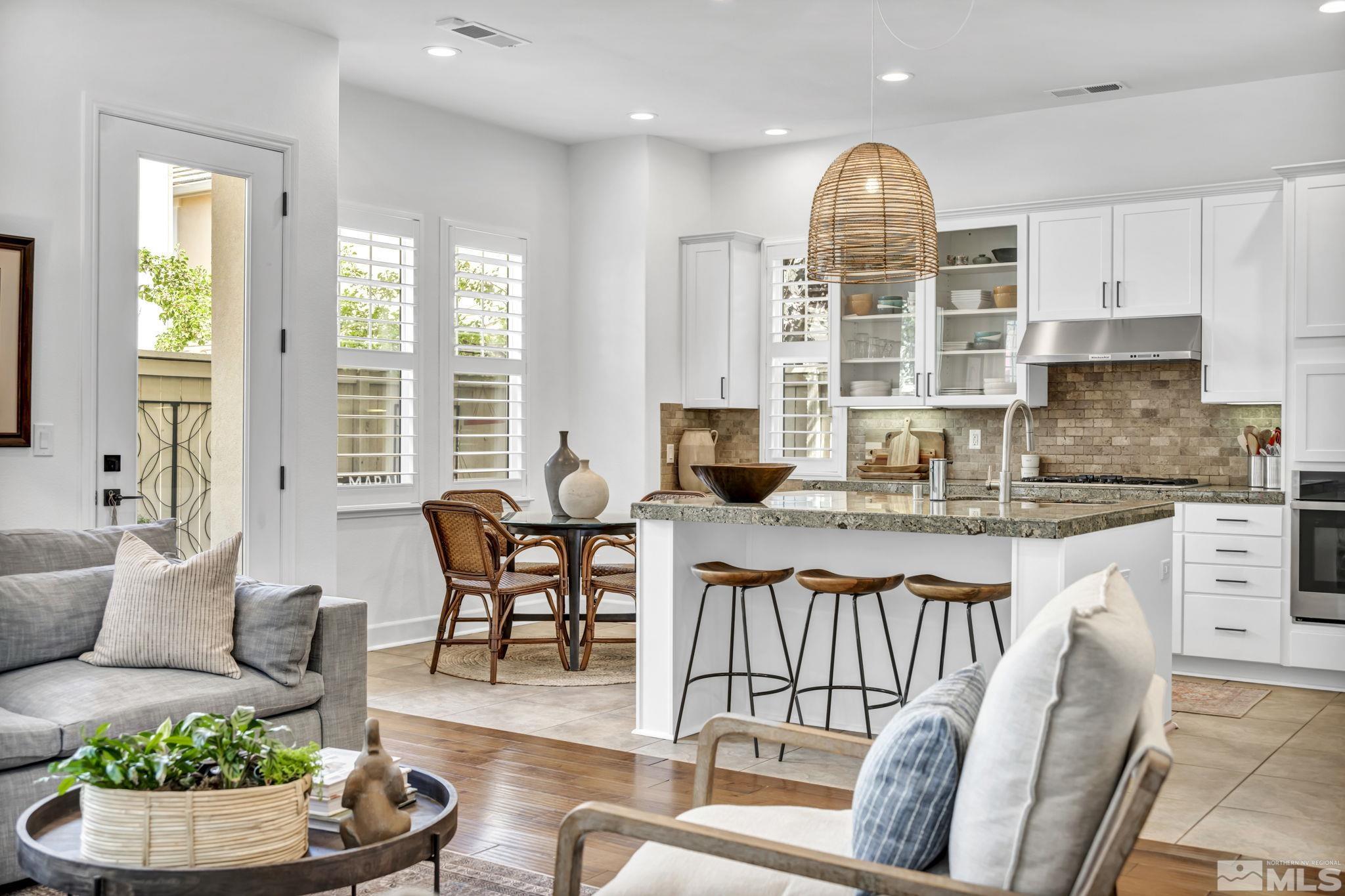 7665 Stone Bluff Way Reno, NV 89523 - Photo 13 of 40 a view of a kitchen with workspace and a window
