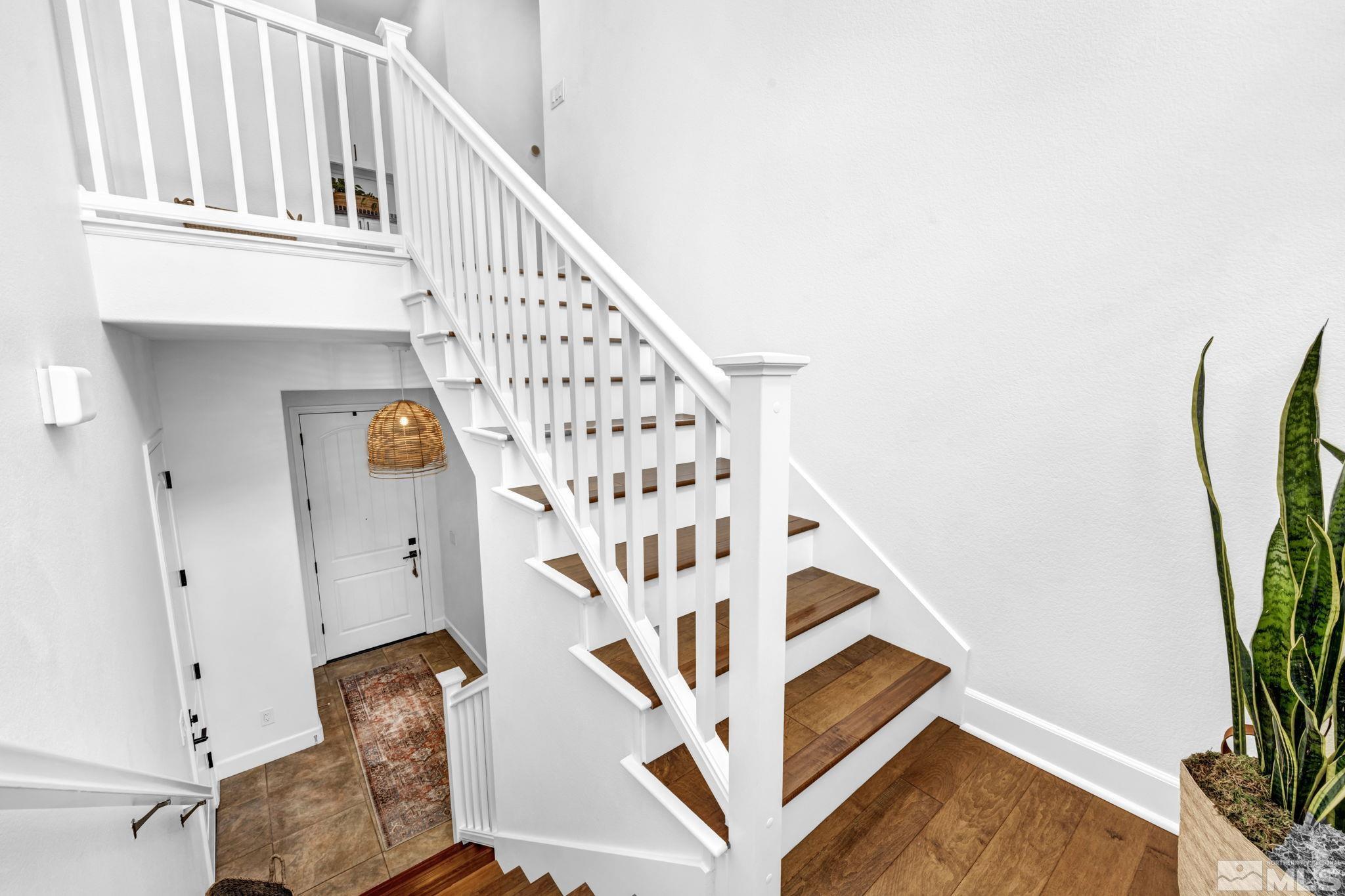 7665 Stone Bluff Way Reno, NV 89523 - Photo 14 of 40 a view of entryway with wooden floor