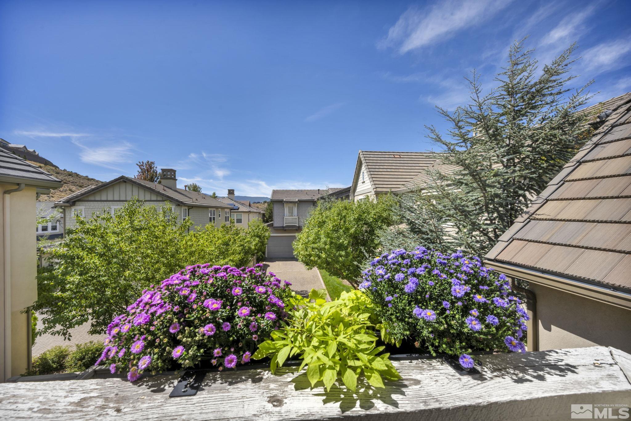 7665 Stone Bluff Way Reno, NV 89523 - Photo 16 of 40 a flower plants with wooden fence