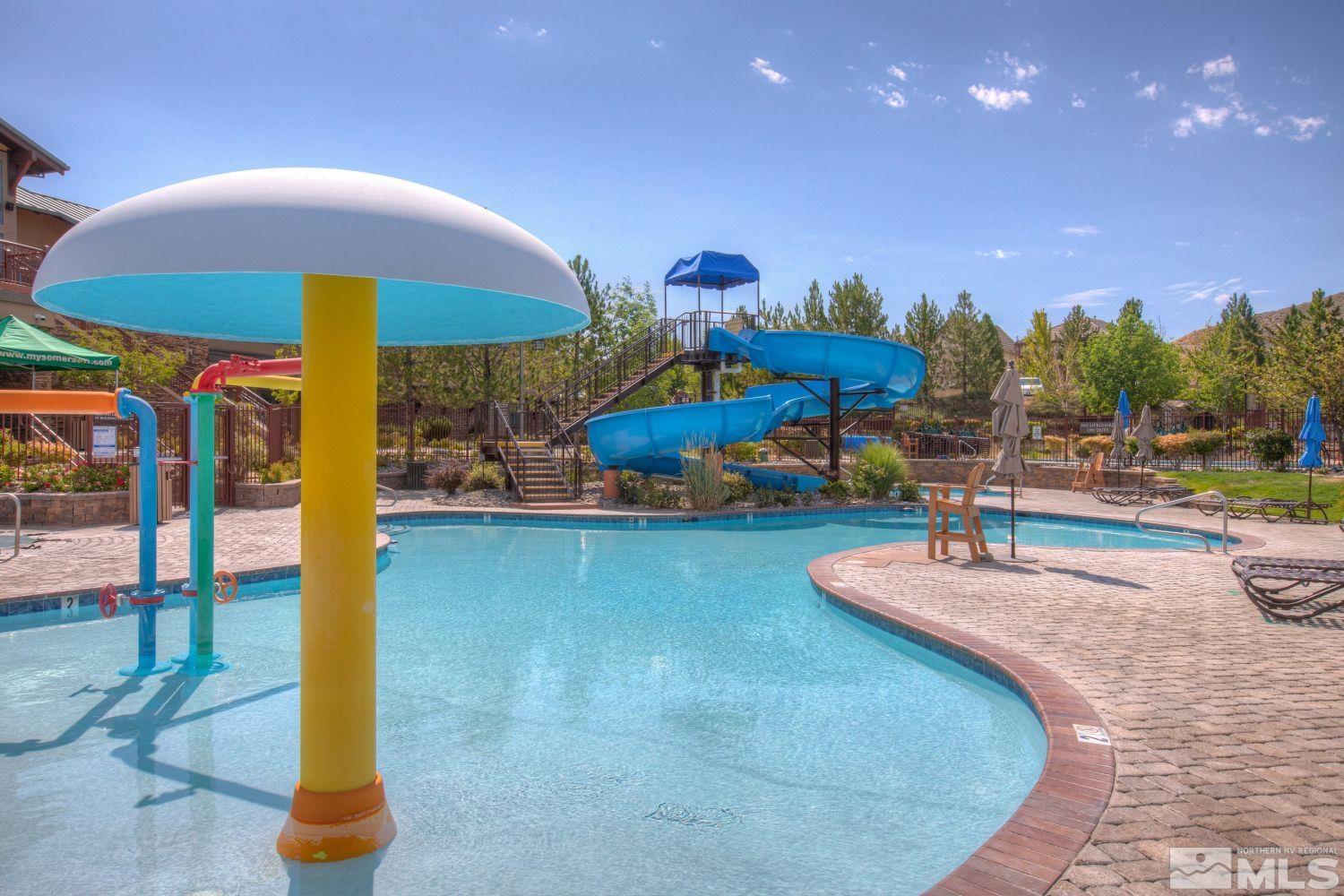 7665 Stone Bluff Way Reno, NV 89523 - Photo 38 of 40 a view of a swimming pool with a patio