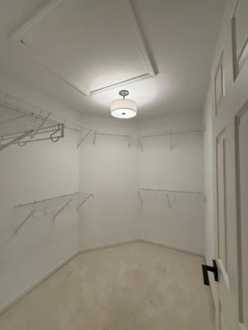 a view of a room with racks on the wall