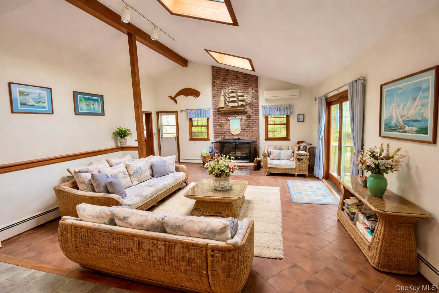250 Paradise Point Road Southold, NY 11971 - Photo 3 of 24 a living room with furniture and a large window