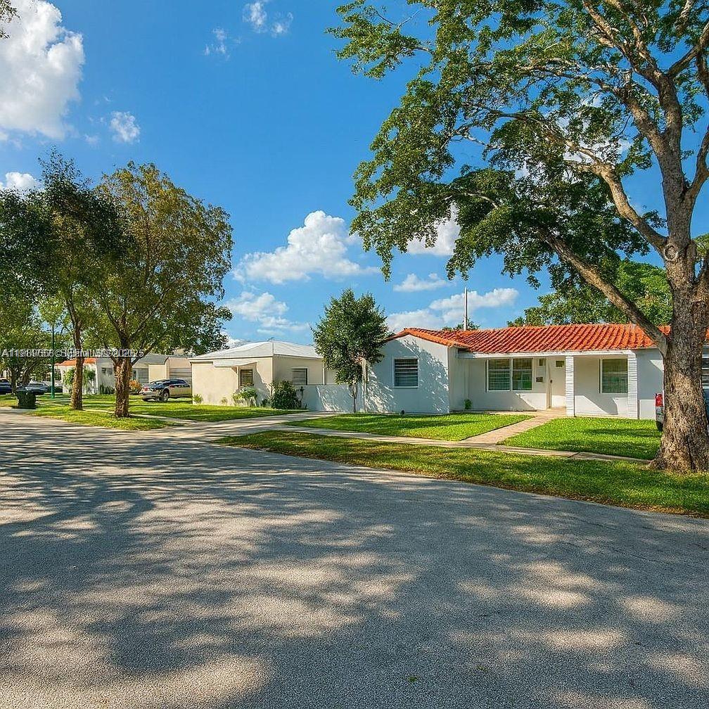 5825 Southwest 9th Terrace, Unit 2 West Miami, FL 33144 - Photo 1 of 11 a view of a house with a yard