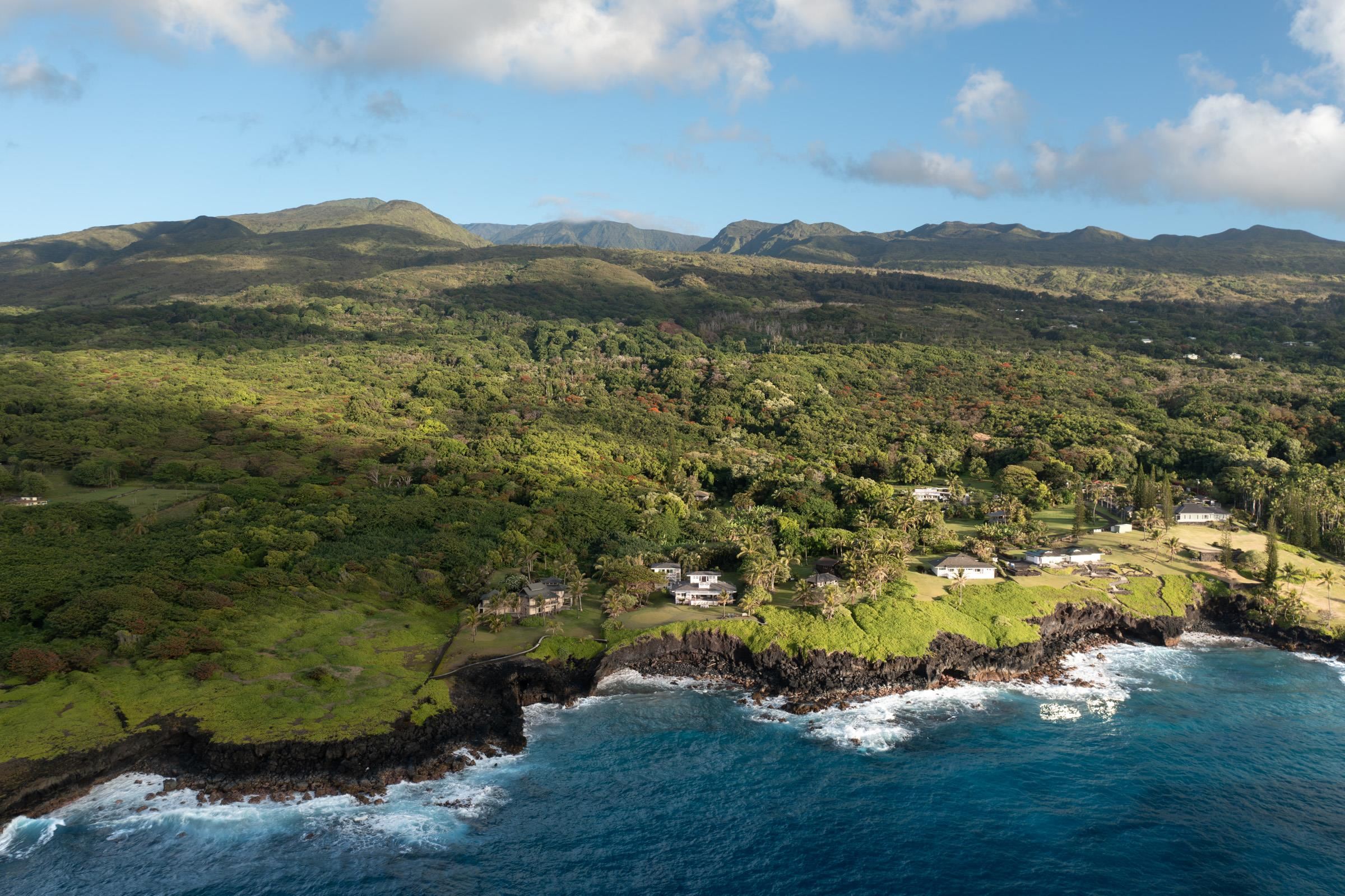 51 Kapohue Road Hana, HI 96713 - Photo 4 of 50 a view of a town with mountains in the background