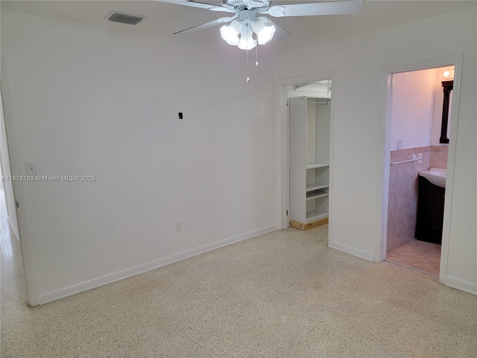 3375 Southwest 28th Street, Unit 3375 Miami, FL 33133 - Photo 12 of 20 a view of a livingroom with a fireplace