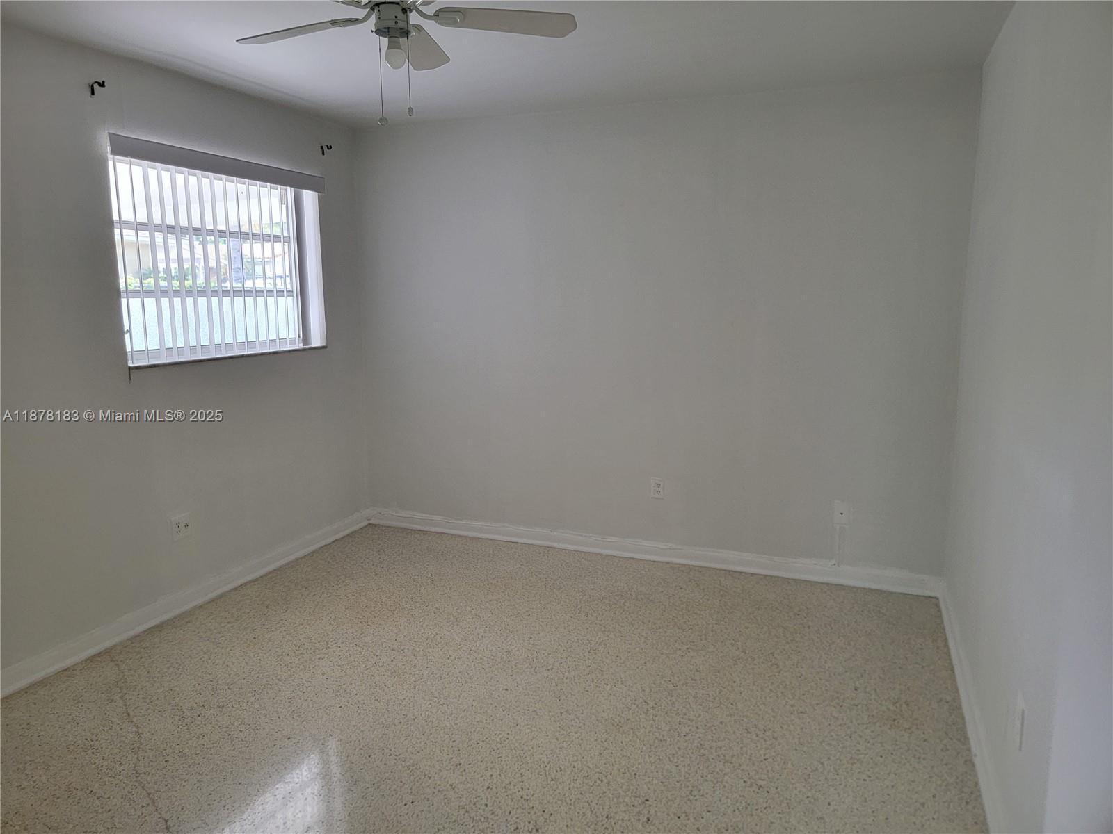 3375 Southwest 28th Street, Unit 3375 Miami, FL 33133 - Photo 15 of 20 an empty room with windows