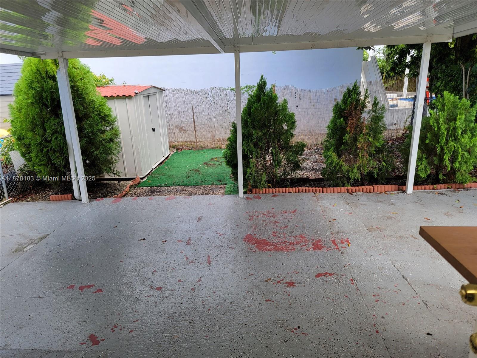 3375 Southwest 28th Street, Unit 3375 Miami, FL 33133 - Photo 17 of 20 a view of a backyard