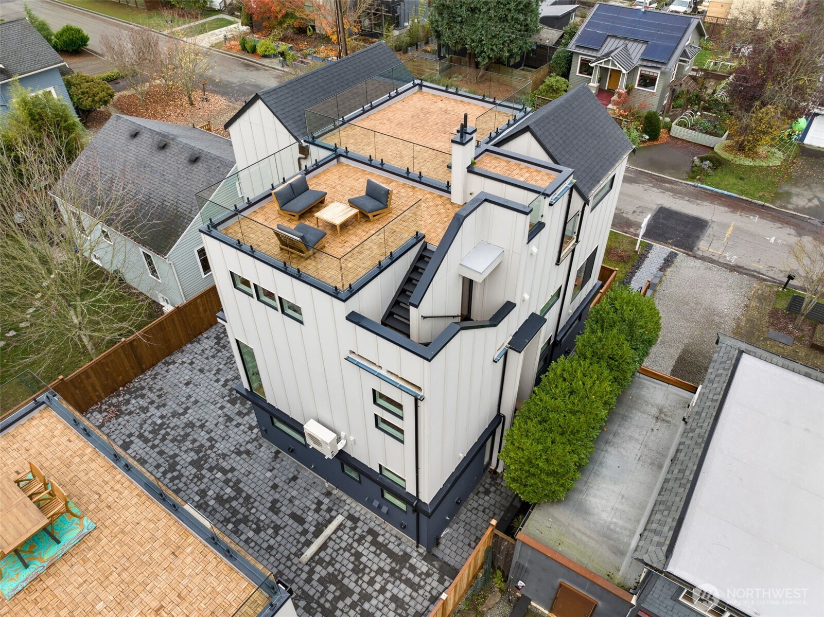 315 Northwest 86th Street, Unit B Seattle, WA 98117 - Photo 14 of 17 an aerial view of a house with garden