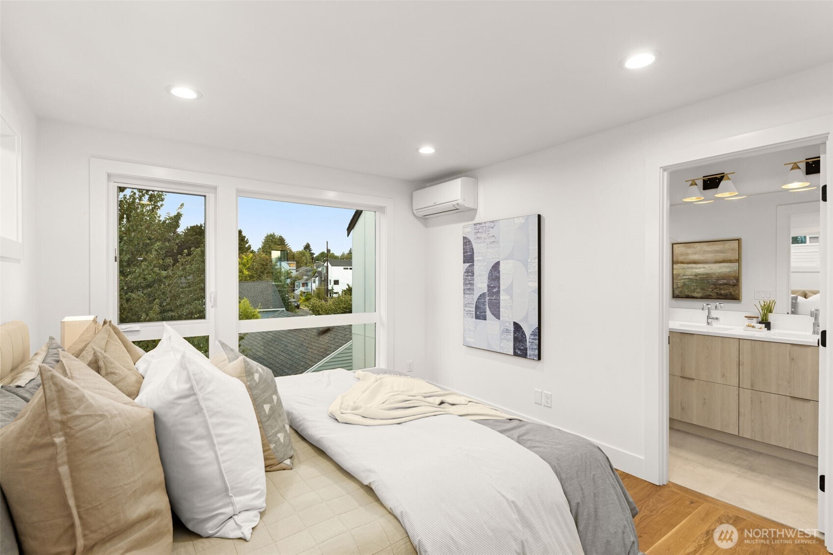 315 Northwest 86th Street, Unit B Seattle, WA 98117 - Photo 8 of 17 a bedroom with a bed and window