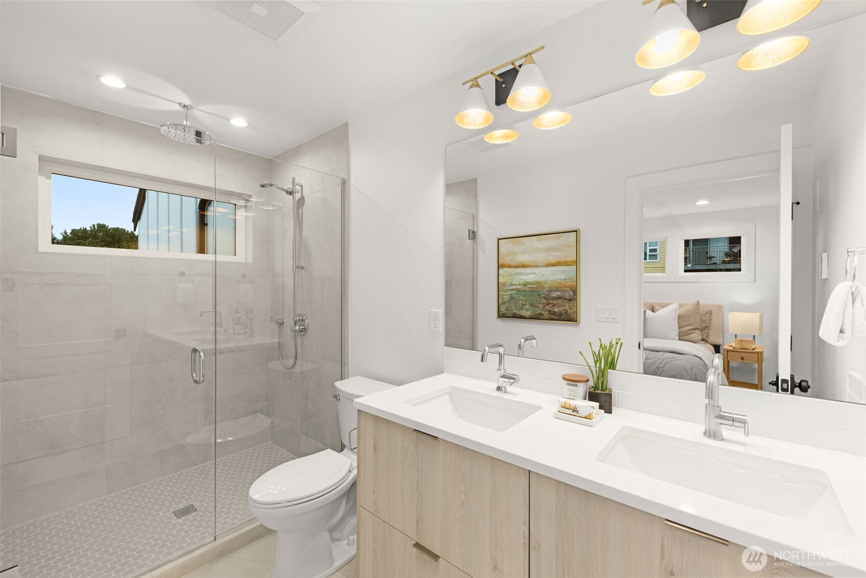 315 Northwest 86th Street, Unit B Seattle, WA 98117 - Photo 9 of 17 a bathroom with a sink toilet and shower