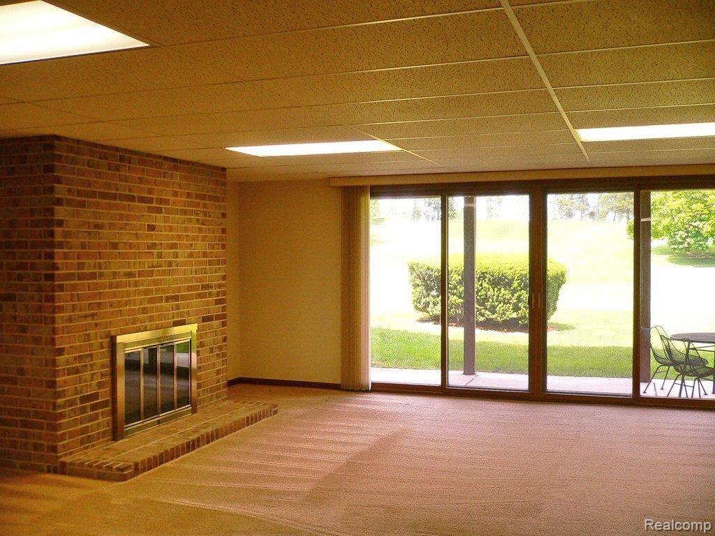 940 GreenView Court, Unit 29 Rochester, MI 48307 - Photo 15 of 25 Lower Level Family Room
