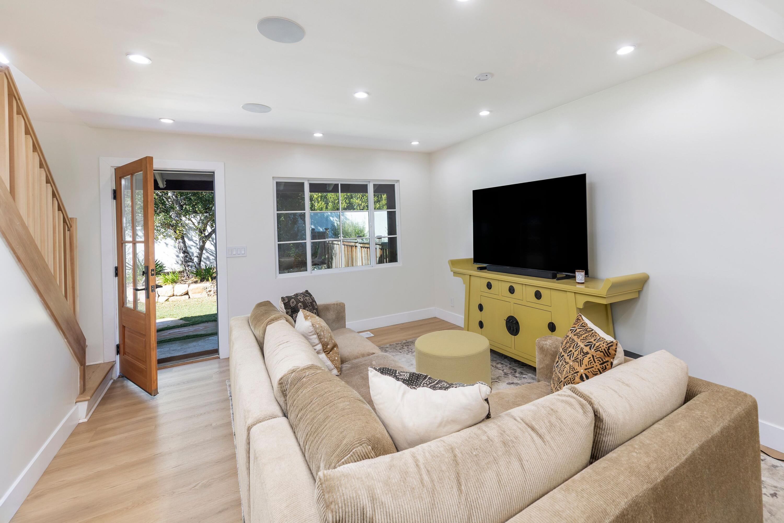 487 Hot Springs Road Santa Barbara, CA 93108 - Photo 21 of 47 a living room with furniture and a flat screen tv