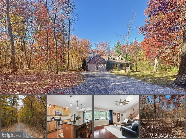 a front view of a house with a garden and plants