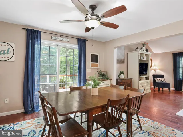 a bedroom with a bed and a chair