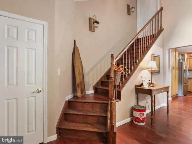 a bedroom with a bed and furniture