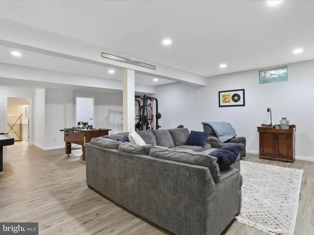 a bathroom with a sink a mirror and a toilet