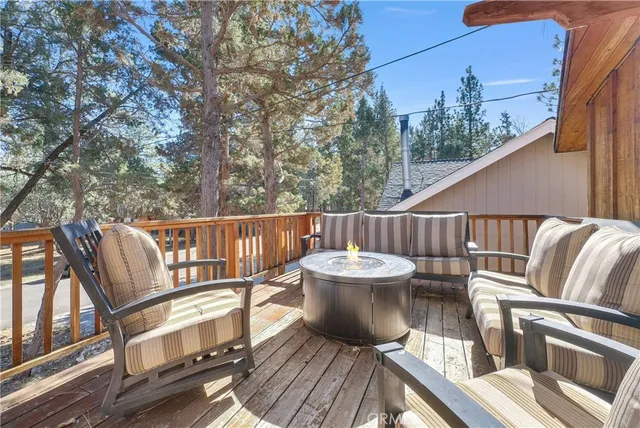 a view of balcony with wooden floor