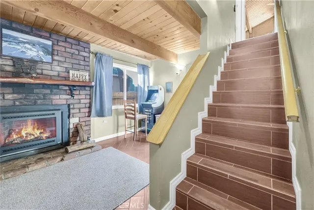 a view of an entryway with fireplace