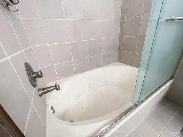 a bathroom with a bathtub