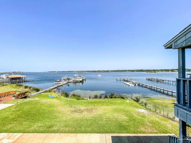 a view of a swimming pool with an ocean view