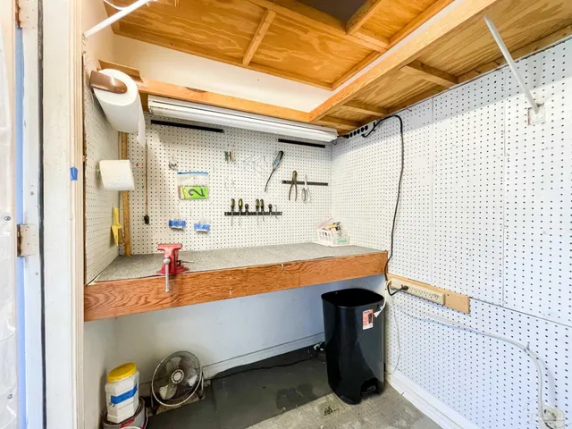 a room with table and chairs