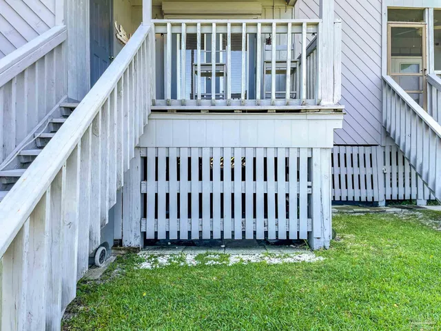 a view of deck with wooden fence and floor