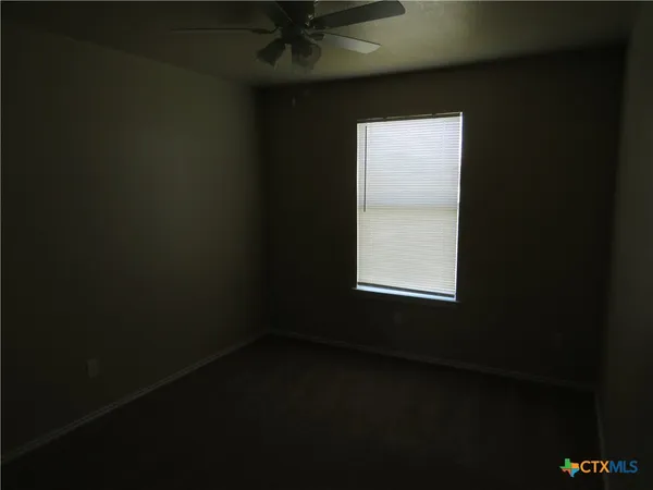 a view of a small space with a window