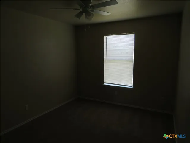 a view of a small space with a window