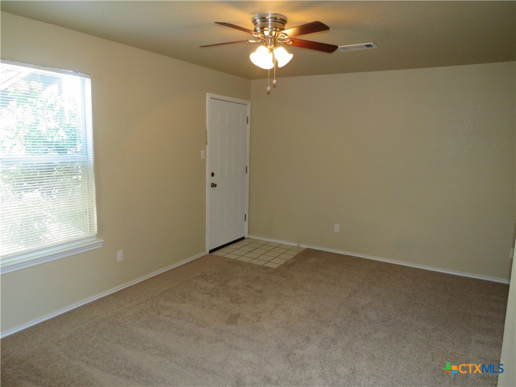 1602 Benttree Drive, Unit B Killeen, TX 76543 - Photo 3 of 15 an empty room with a window