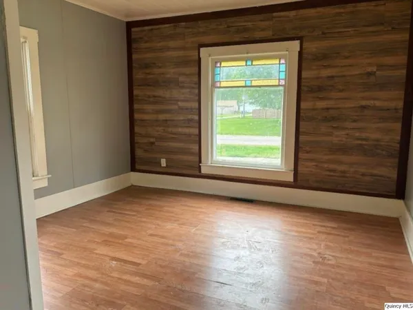 an empty room with window