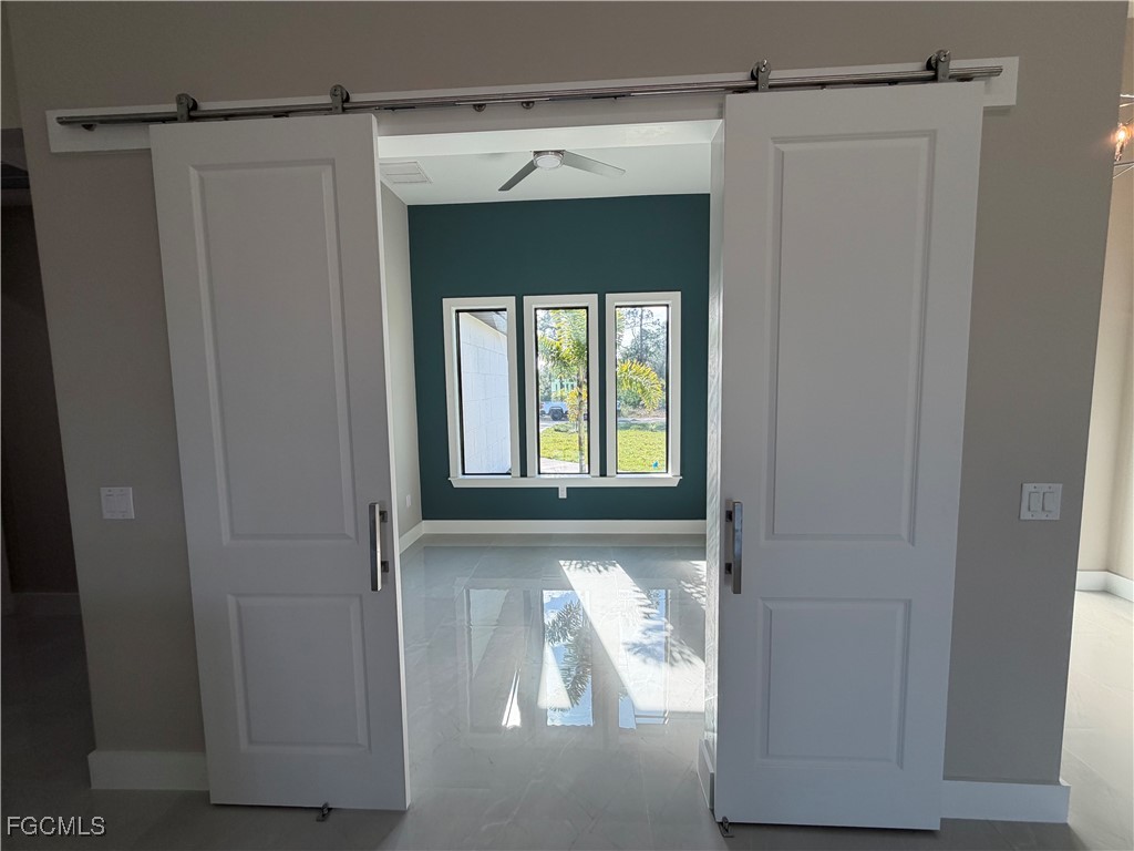 7968 3rd Terrace Lehigh Acres, FL 33936 - Photo 15 of 18 a view of front door