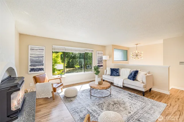 a living room with furniture and a rug