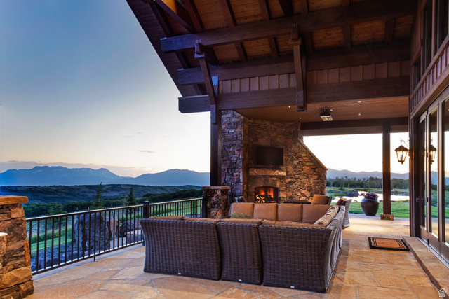 2322 North Westward Ho Road Heber City, UT 84036 - Photo 40 of 54 View of patio / terrace with an outdoor living space with a fireplace
