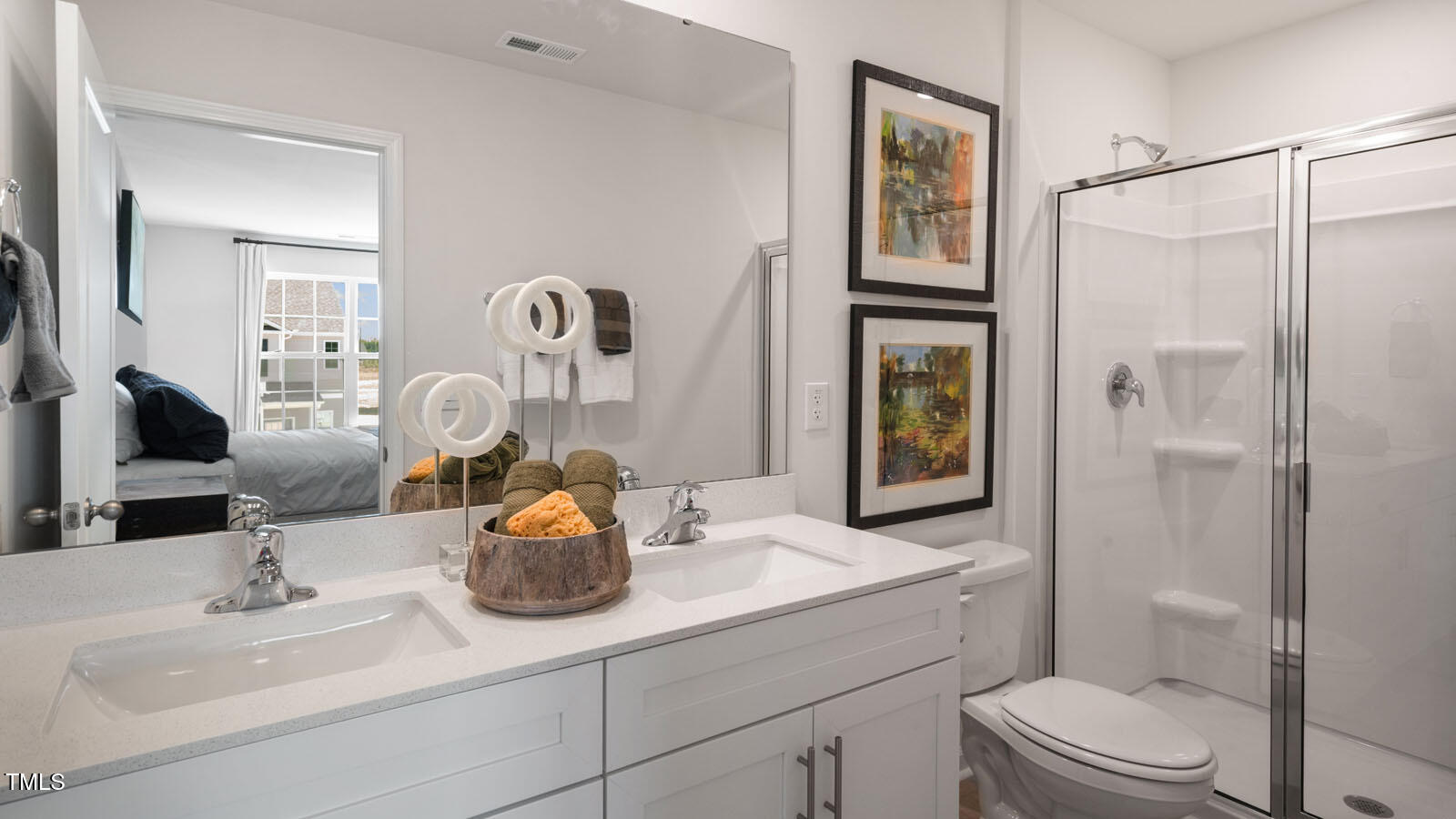 5233 Red Crimson Drive Willow Spring, NC 27592 - Photo 25 of 35 a bathroom with a sink a toilet and shower