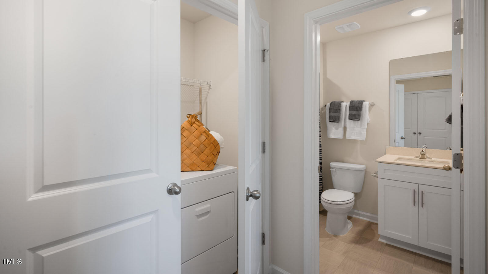 5233 Red Crimson Drive Willow Spring, NC 27592 - Photo 27 of 35 a bathroom with a granite countertop toilet and a sink