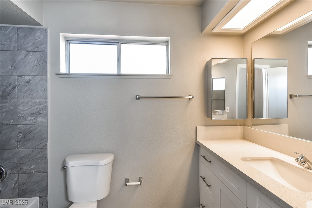 741 Round Table Drive Las Vegas, NV 89110 - Photo 17 of 22 Full bathroom featuring vanity and washtub / shower combination