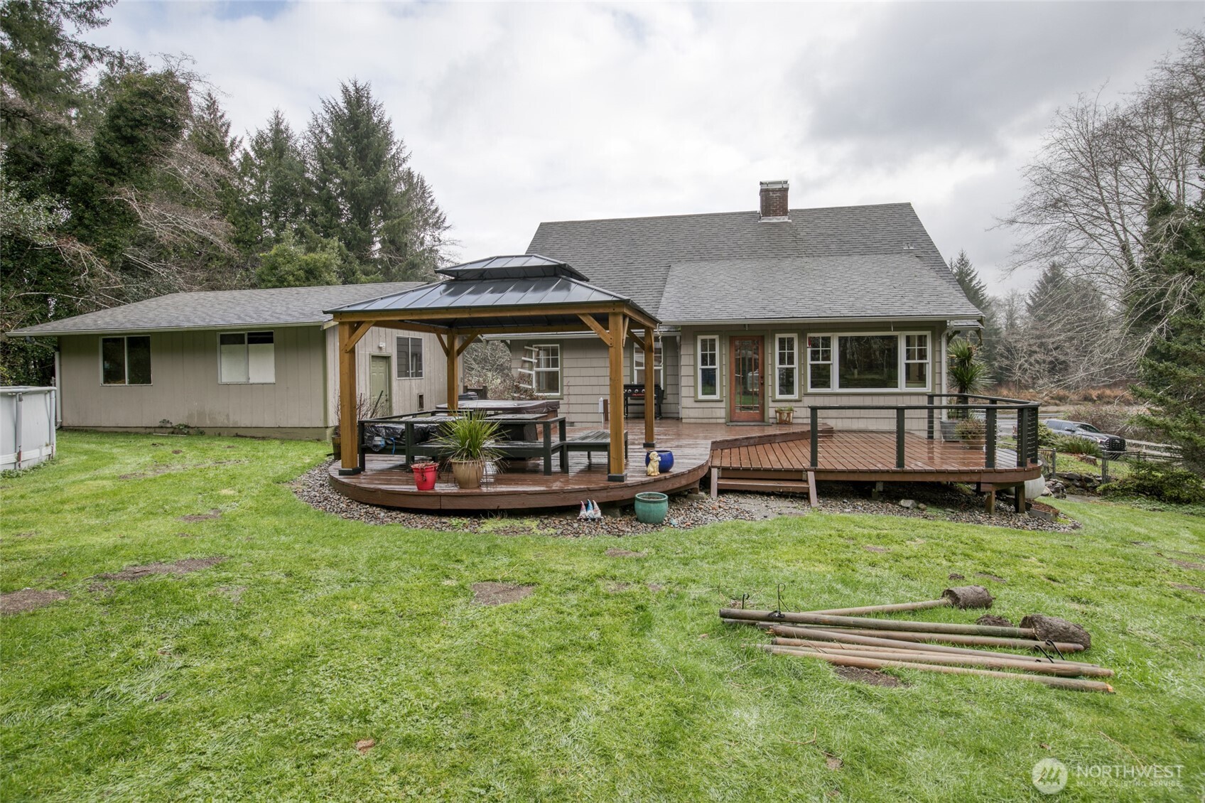 3321 Wishkah Road Aberdeen, WA 98520 - Photo 30 of 40 a front view of a house with a yard table and chairs