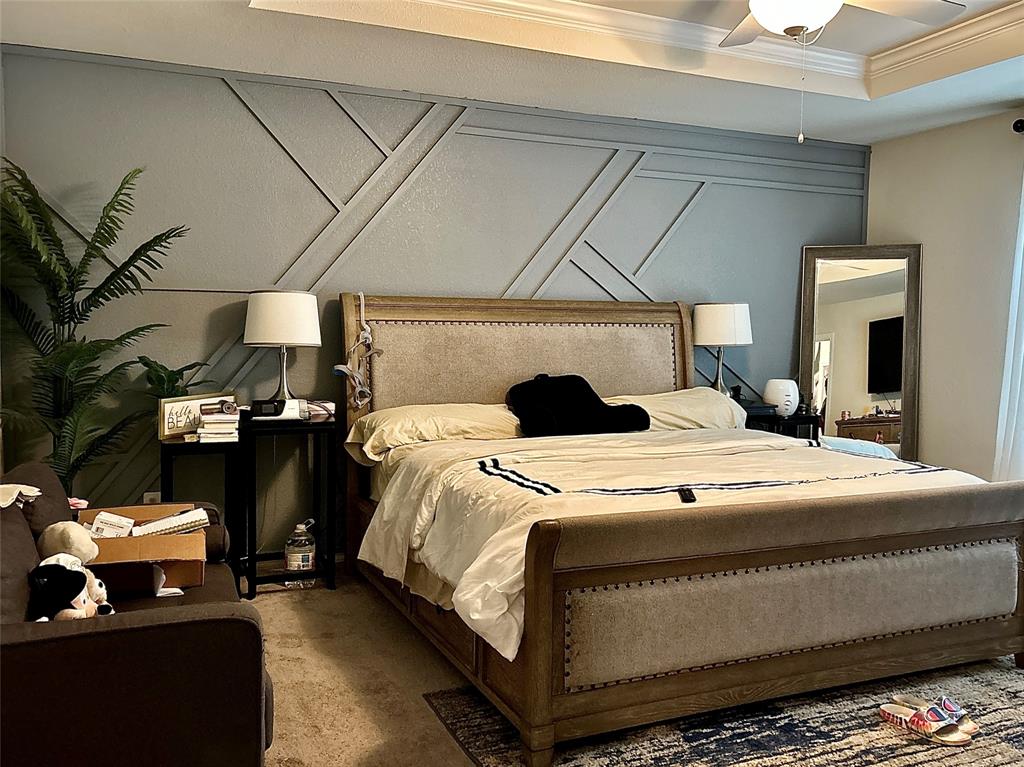 10109 Wyseby Road Crowley, TX 76036 - Photo 15 of 25 a bedroom with a bed and a mirror