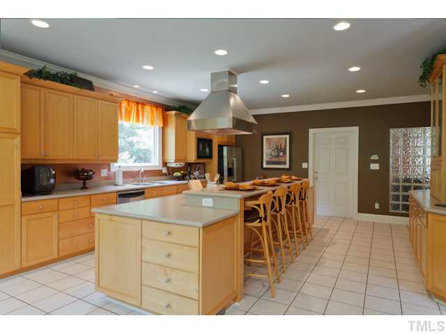 7716 Senter Farm Road Apex, NC 27539 - Photo 16 of 25 A second view of the kitchen. You'll love the abundant counter space.